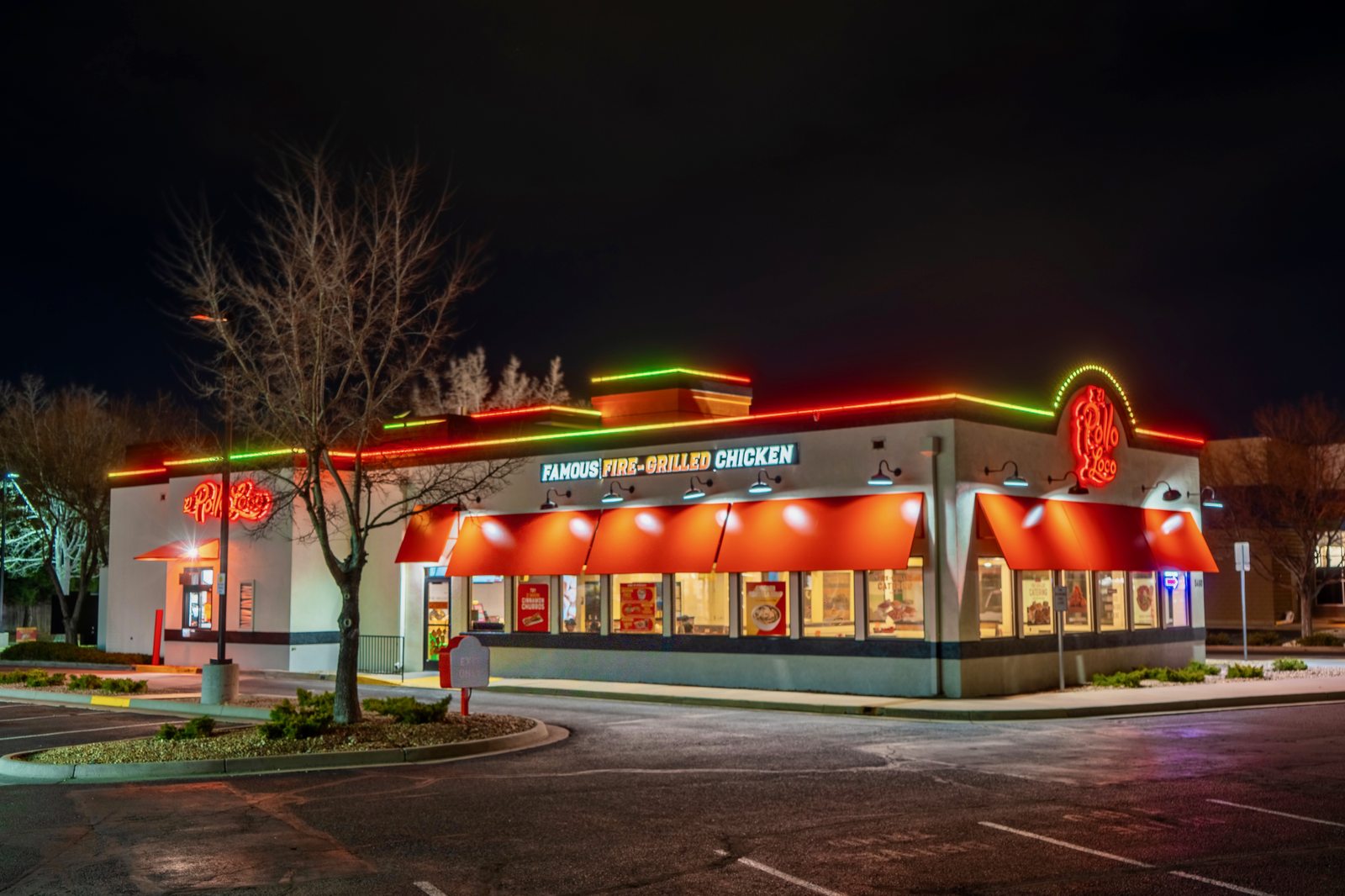 Restaurant with permanent red and green roofline lighting