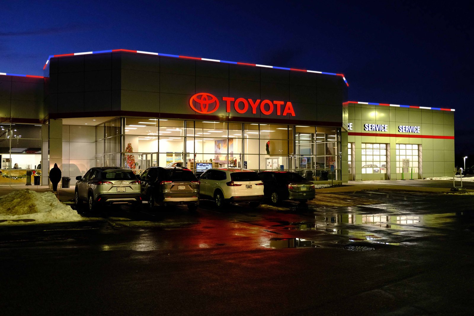 Toyota dealership with permanent red, white and blue roofline lighting