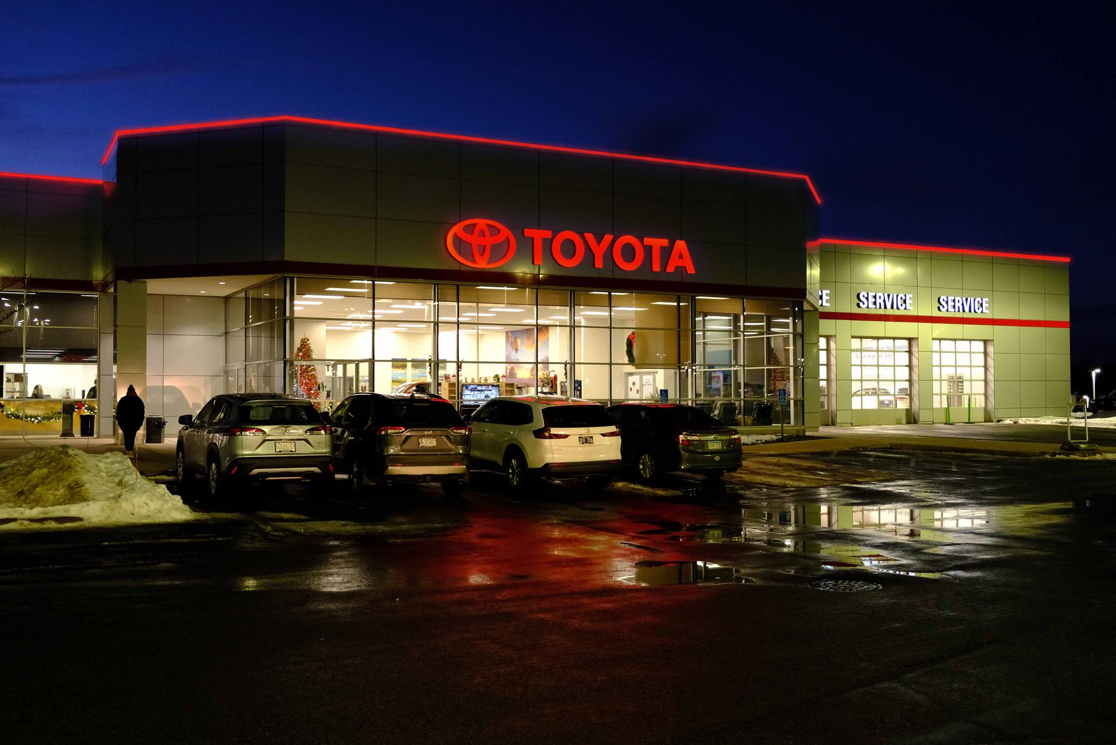 Toyota dealership with permanent red roofline lighting