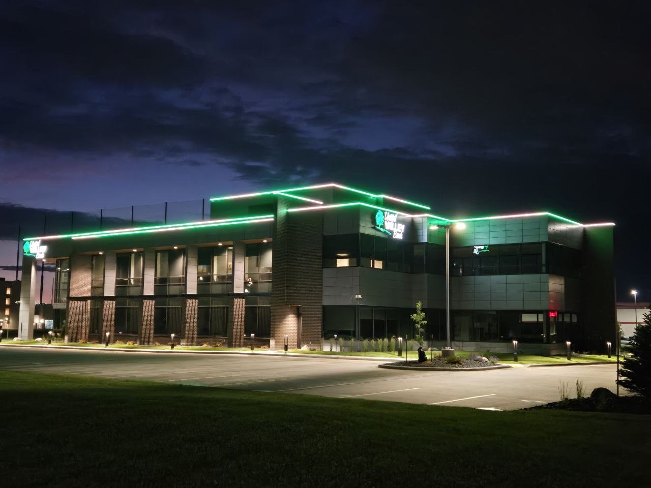 Bank building with permanent green accent lighting