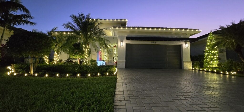 Front entrance with garland and red bows