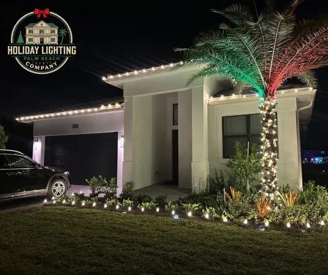 Home with red and white roofline lighting