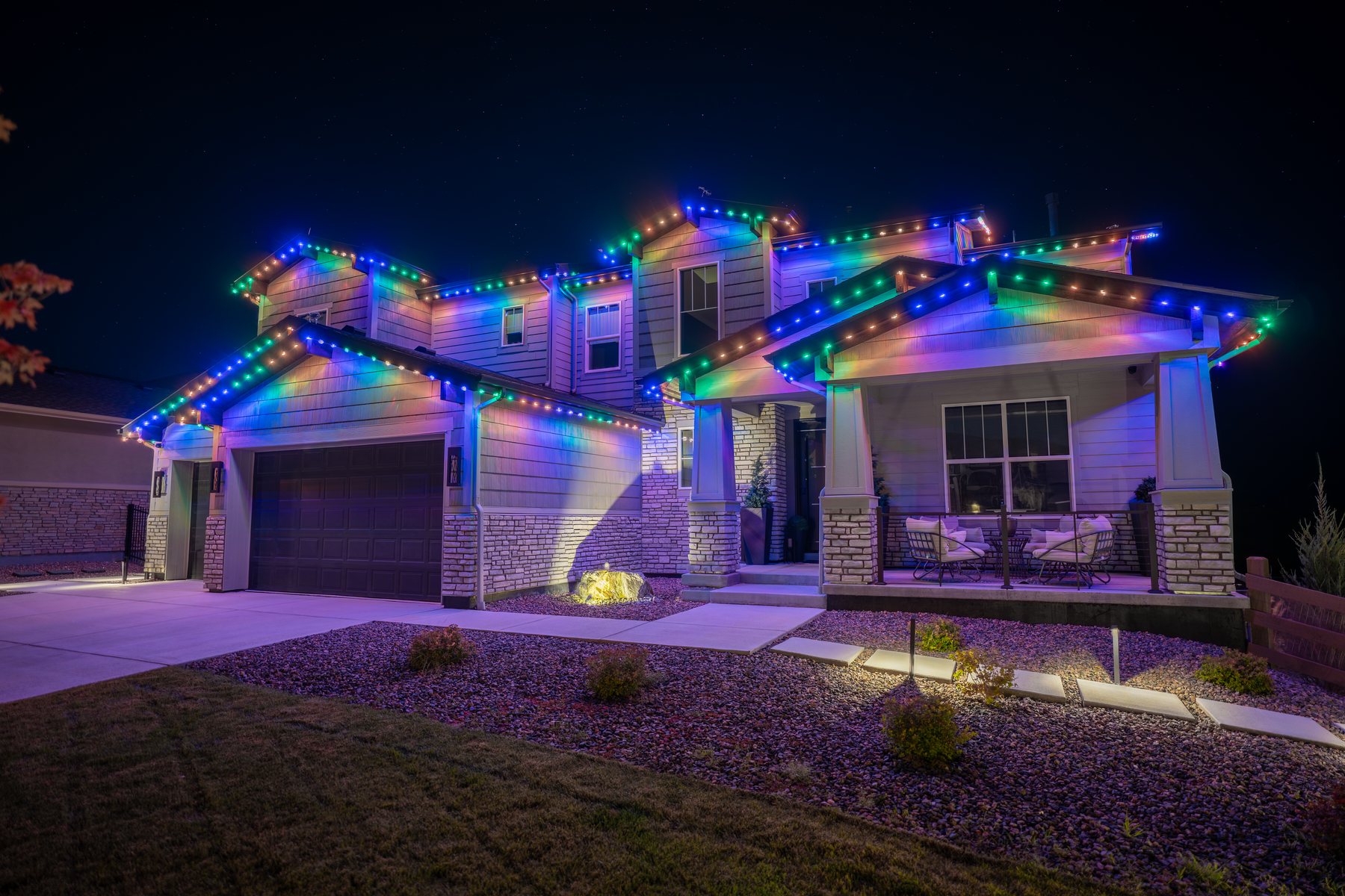 Same home with blue and warm white permanent lighting