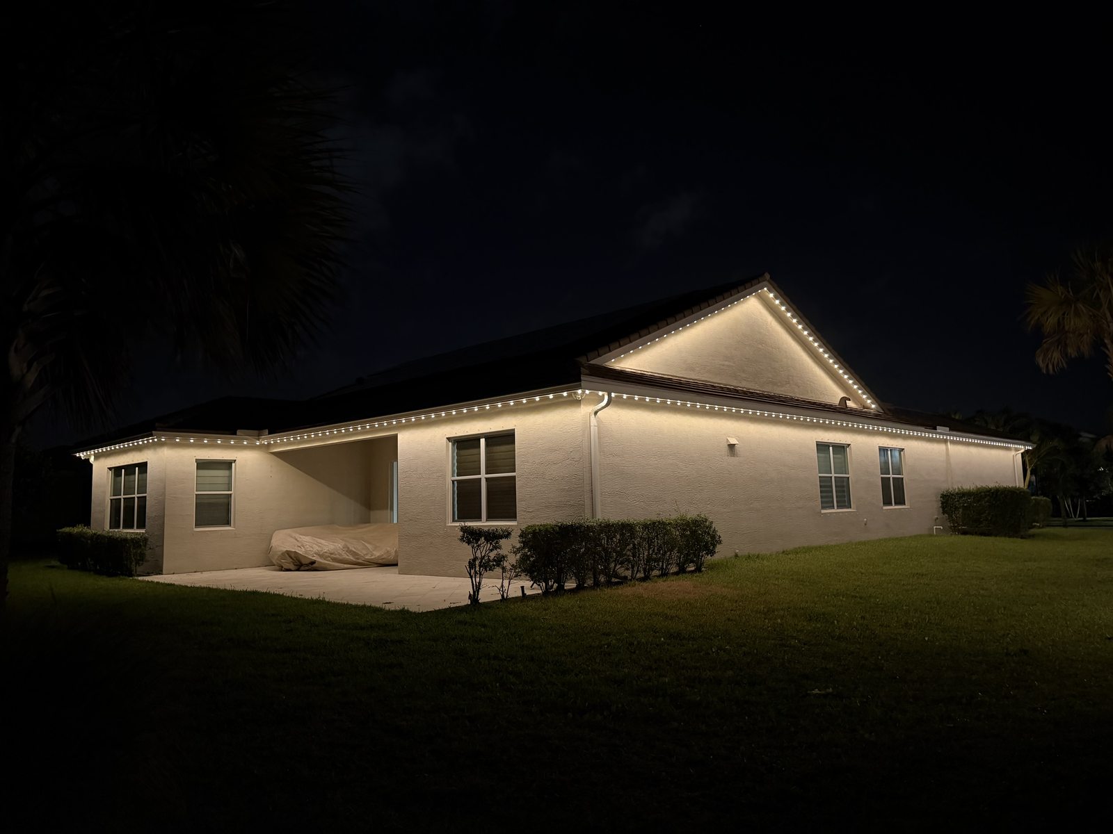 Home with warm white permanent downlighting